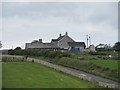 Houses near the junction with the Ballinran Road