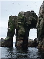 NA6946 : Flannan Isles: natural arches on Roaiream by Chris Downer