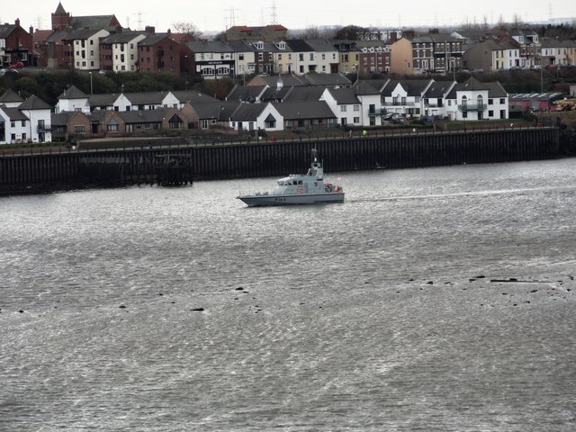 Naval Training vessel going downriver