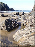 SW8572 : Porthcothan Bay at low tide by Val Pollard