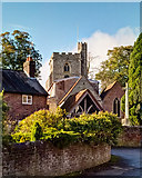 TL0211 : Church Porch and Tower by Tom Presland