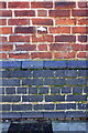 Benchmark on Yew Tree Community School wall, Village Road