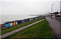 Beach huts and grass slope by Western Esplanade