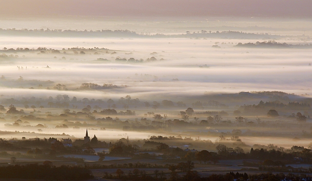 Castlemorton church with mist over Longdon Marsh