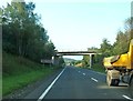 NX9576 : Bridge carrying Ash Road over the A75 by Ann Cook