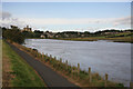 NU2505 : Warkworth Castle in the distance by roger geach