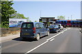 Traffic waits on North Bridge for a diesel multiple unit