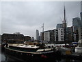 View of a towerblock in Canary Wharf, The Gentry and the Citibank Building from Poplar Dock