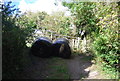 Bales by a farm gate