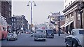 TQ2982 : Northward on Tottenham Court Road, approaching Euston Road, 1962 by Ben Brooksbank