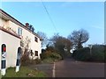 SX8999 : Summerdown Cottage at Shute Cross and the road to Brampford Speke by David Smith