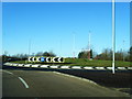Roundabout on A484 with distinctive theme