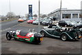 Side view of two Morgan cars parked opposite Newtown Motors, Cwmbran