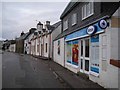 NG7977 : Shops and businesses in Strath by Richard Dorrell
