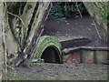 Brick path and bridge over the River Lud