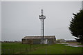 TR0725 : Communications mast off the A259 by Julian P Guffogg