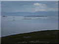 NF9283 : Berneray: view over the Sound of Harris rocks by Chris Downer