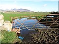 A flooded field gateway on Valley Road