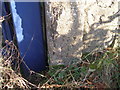 Benchmark on a gatepost beside Mangrill Lane