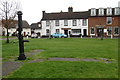 Village pump and library behind