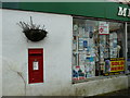 Postbox next to the hardware store