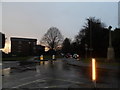 Roundabout at the junction of Park Road and Woodmansterne Lane