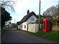 Gussage All Saints: phone box and cottage