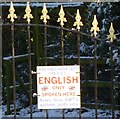 Sign on gate to Rock Lodge