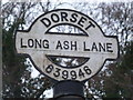 SY6394 : Grimstone: Long Ash Lane signpost detail by Chris Downer