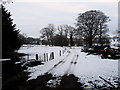 Track leaving the A59 at Smithies Bridge