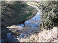 The meandering Kilkeel River above the Newcastle Road Bridge