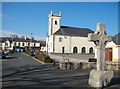 The replica Drumgooland High Cross besides Castlewellan