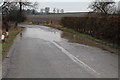 SK6758 : Flooded road near Kirklington by J.Hannan-Briggs