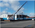 Crane towers over garage renovation, Corporation Road, Newport