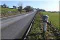 Milepost beside the A523