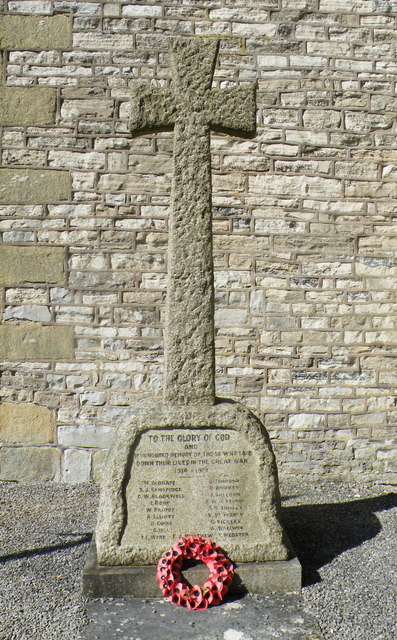 WW1 Memorial Cross inside the grounds of the Holy Trinity Church, Ashford in the Water