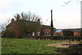 Ivy House Farm and ivy covered pole