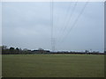 Farmland and pylon off Clay Lane