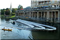 ST7564 : A canoe and a narrowboat at Pulteney Weir, Bath by Jaggery