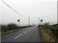 The end of the 30mph zone on B25 on the outskirts of Hillown