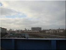 TQ3780 : View of Thornfield House, Rosefield Gardens and St Anne's Church, Limehouse from the DLR by Robert Lamb