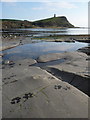 SY9079 : Kimmeridge: dog’s pawprints and rockpool by Chris Downer