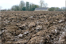 SP3822 : Ploughed land near Deadman's Riding Wood by Graham Horn