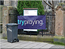 NT2540 : A banner outside St Peter's Church, Eastgate, Peebles by Walter Baxter