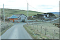 Houses at the roadside near High Ranachan