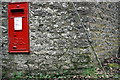 Benchmark and GR letter box in Berkeley Road wall