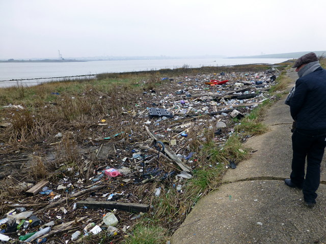 Rubbish on banks of River Thames at Rainham Marshes