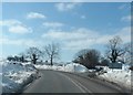 Junction on the A5104 after heavy snowfall