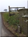 Boundary marker, milestone stone and start of footpath at Hurdwick Farm