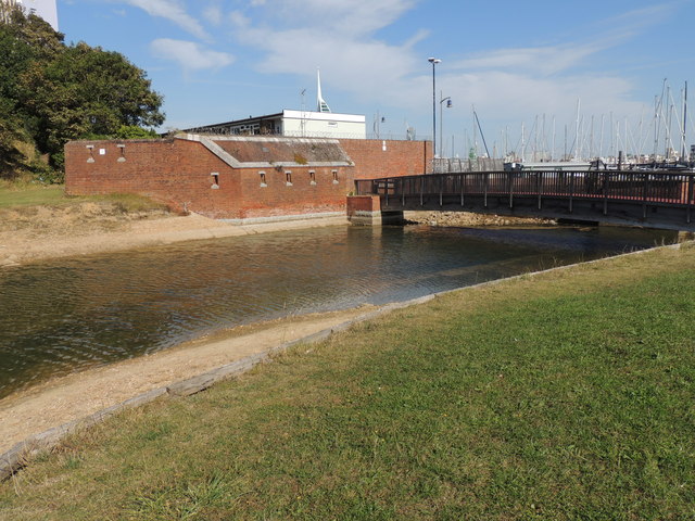 Wooden bridge leading to Gosport promenade with old town defences